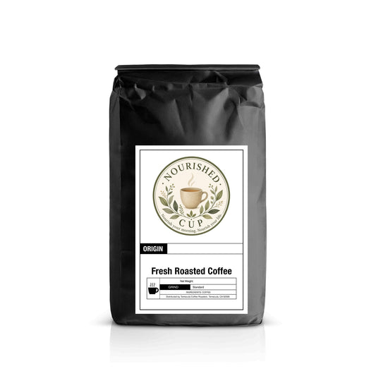Nourished Cup Breakfast Blend on a warm wooden table